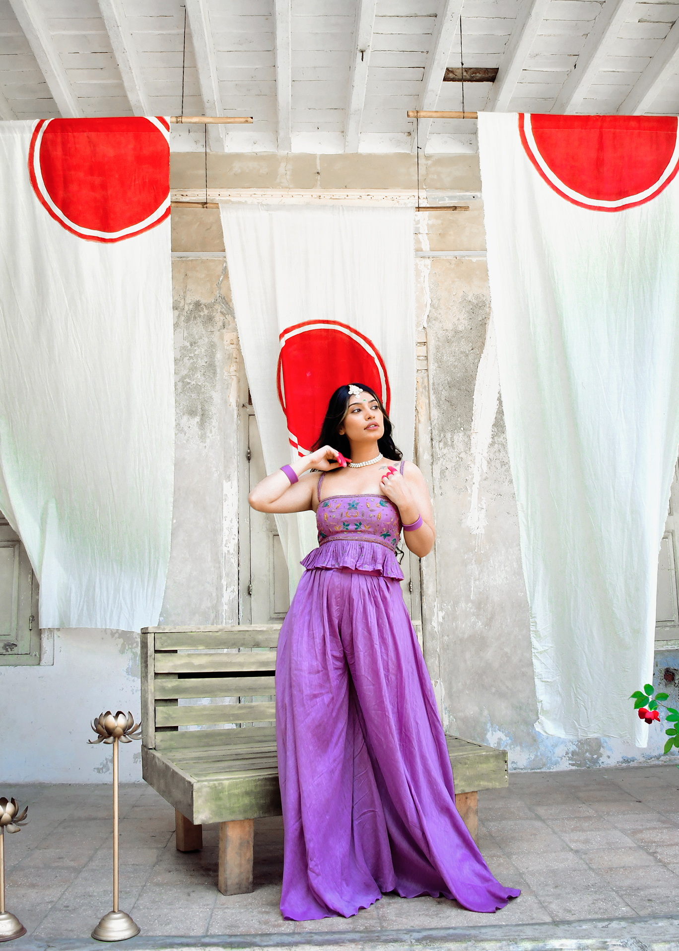 Model wearing a lilac peplum traditional set